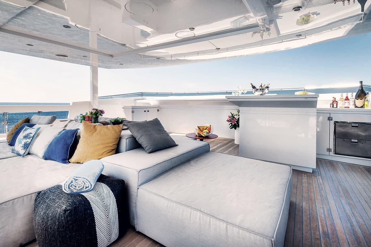 Water and hull detail beside Motor Yacht Serenitas