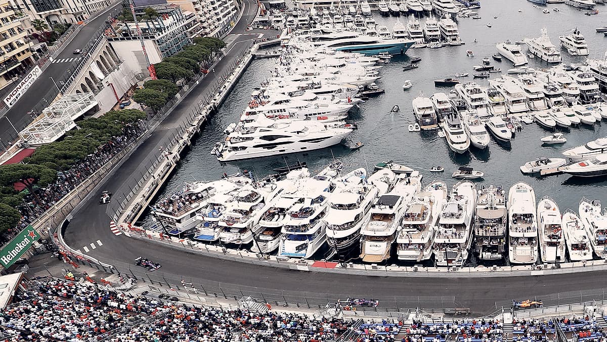 Superyachts moored along the harbour front in Monaco